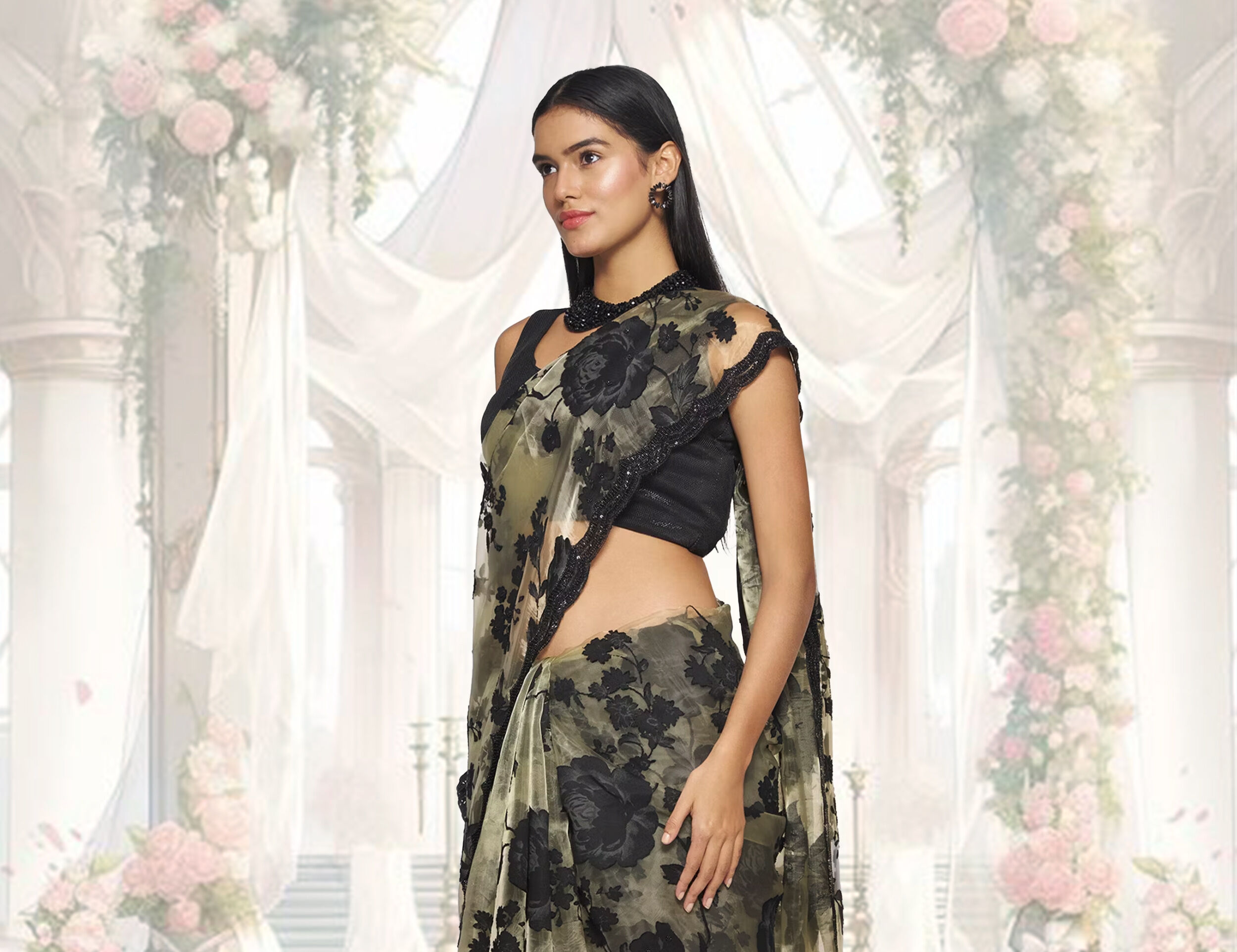 Woman wearing beautiful green luxury saree for wedding celebrations